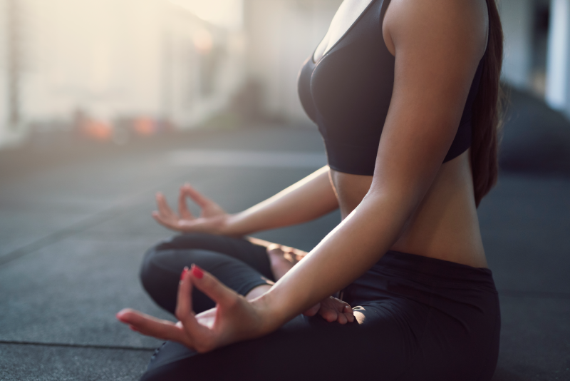 Young women doing Yoga | AspiraBody | Fall River, MA