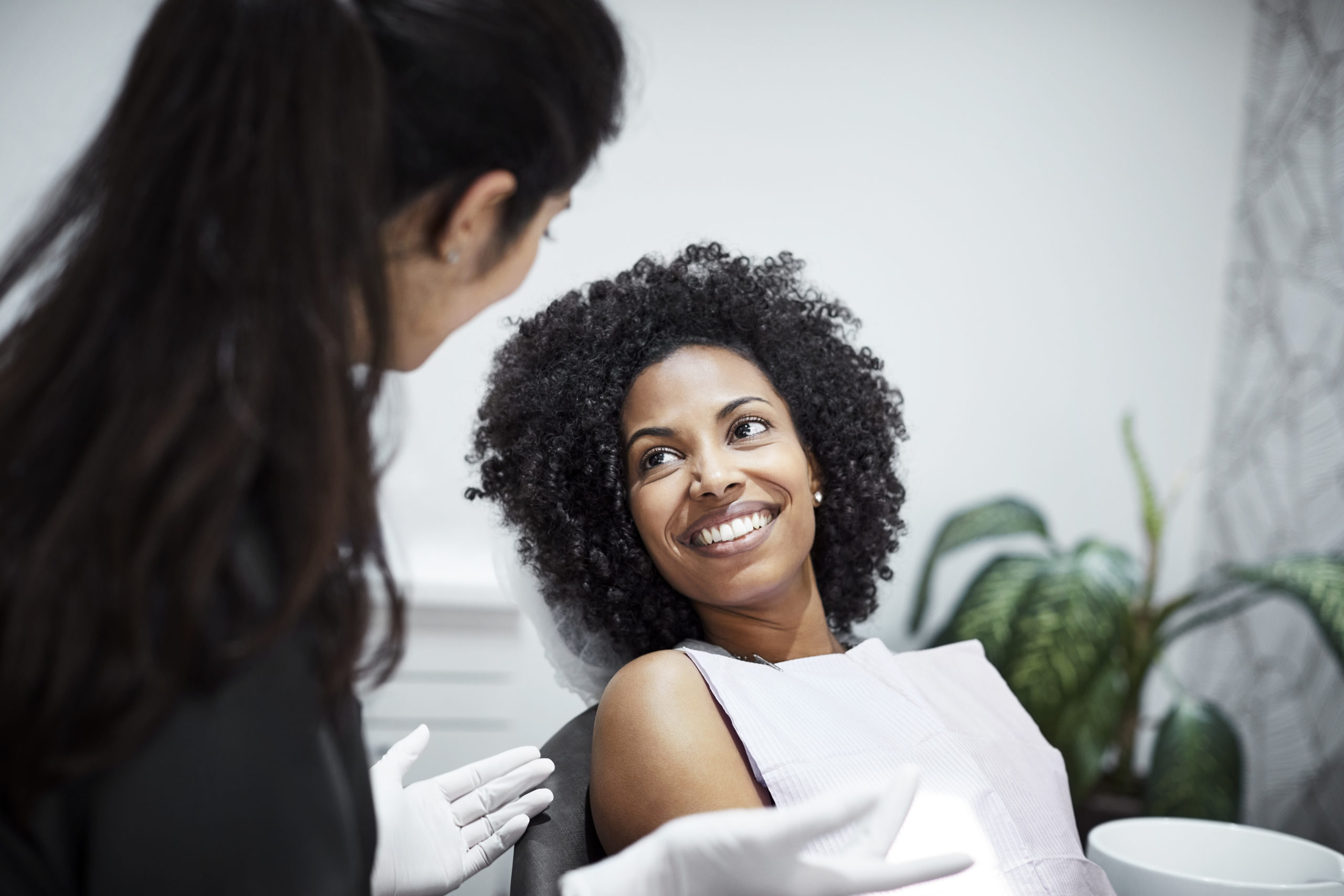 JUVEDERM® Injection consultation with happy black woman at Aspirabody
